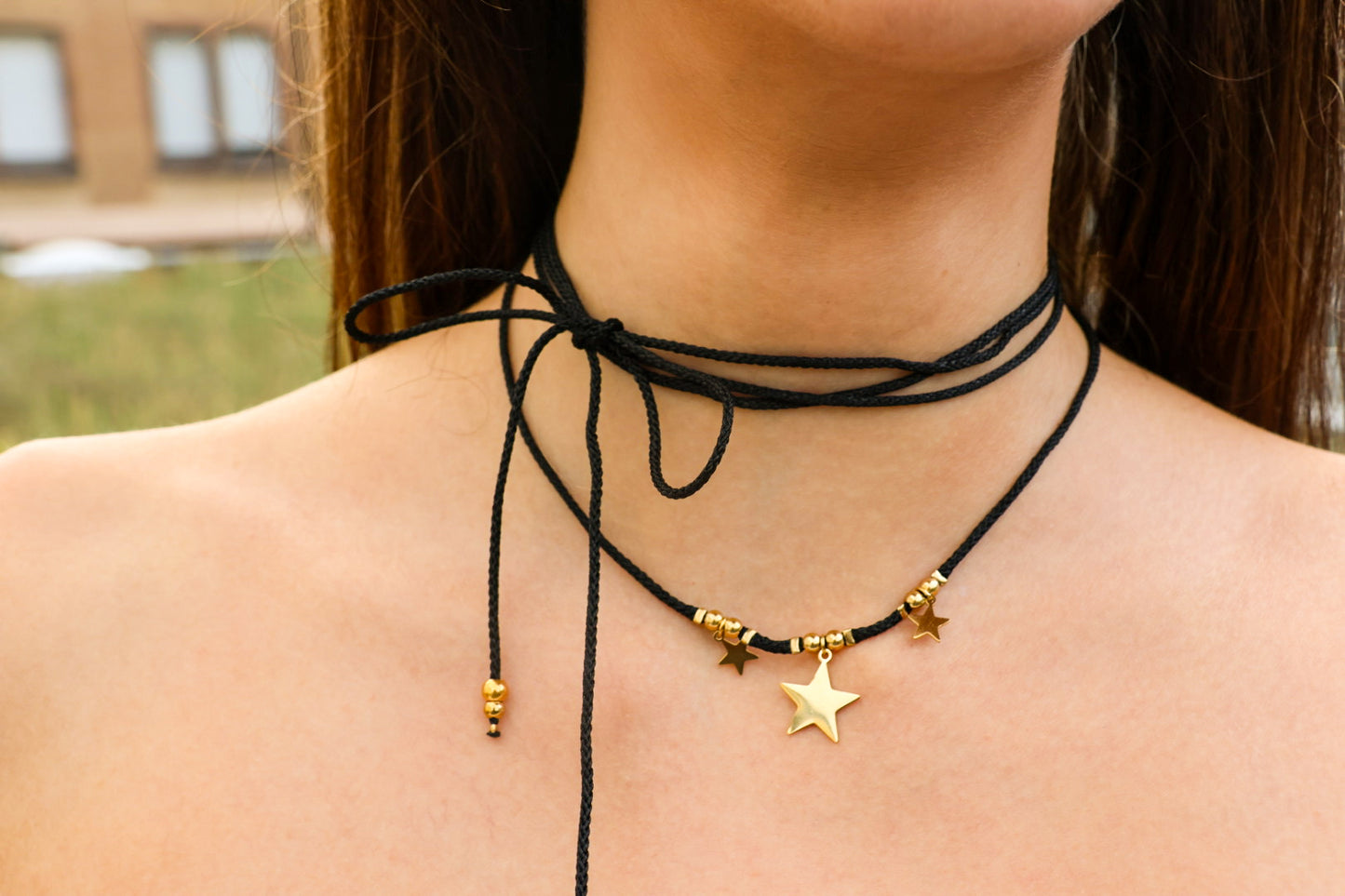 Wickel-Choker schwarz mit Sternen im Gold-Look